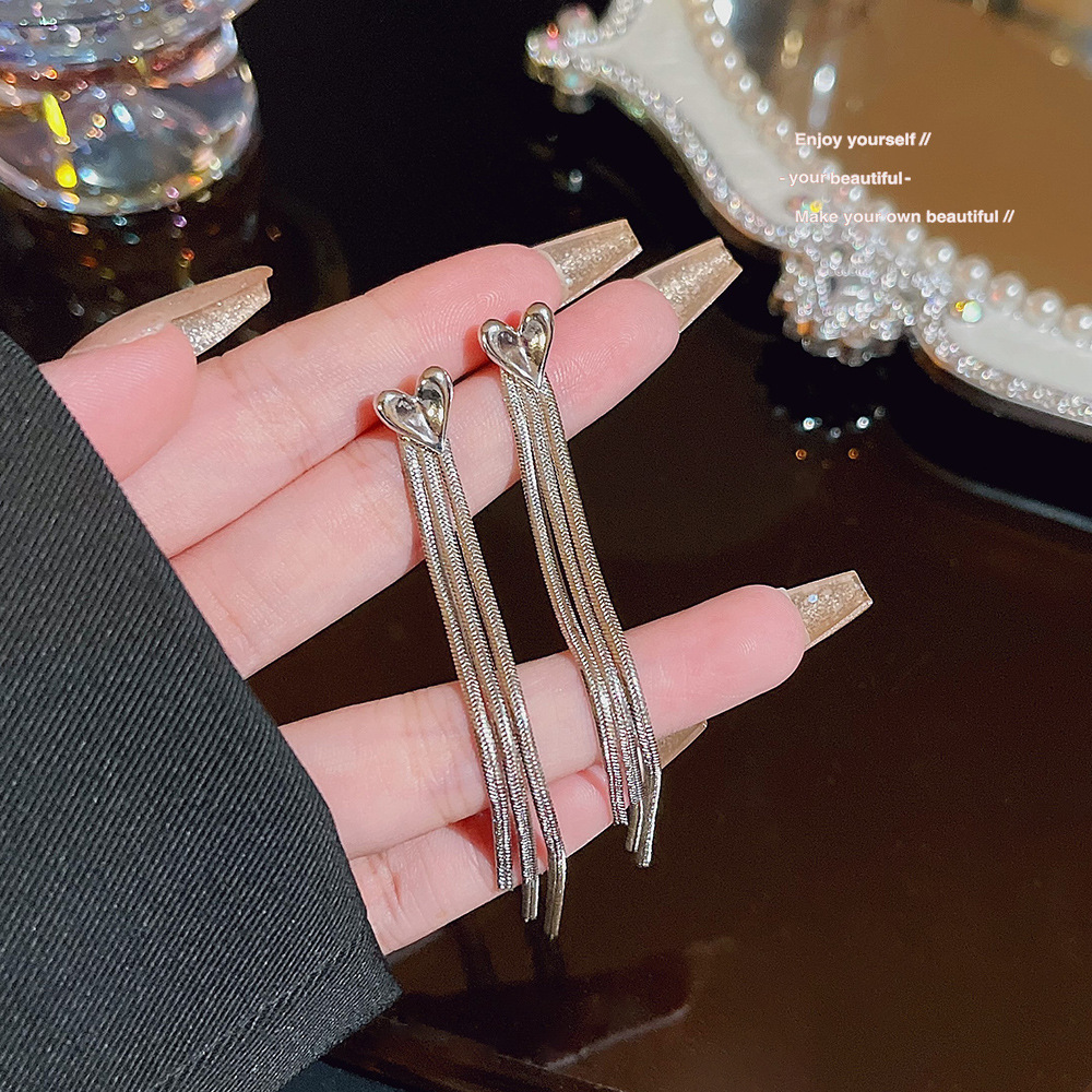 S925 Silver Needle French Long heart-shaped tassel earrings, a summer high-end style, a pair of sweet and exquisite earrings for women details Picture