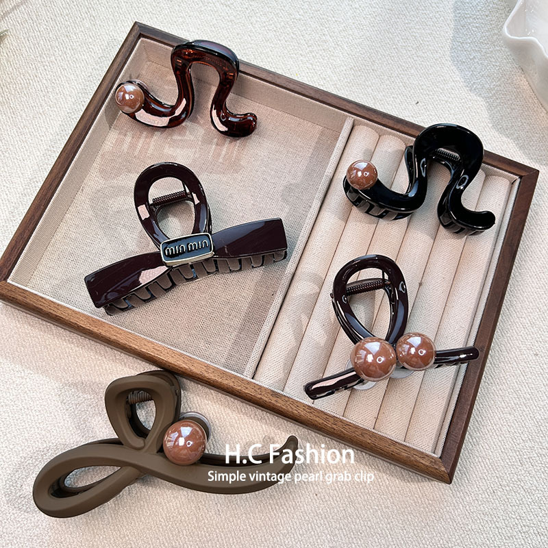 A new Korean-style hair clip for the back of the head, featuring a high-end, niche and light luxury hairpin and a feminine bow shark clip hair accessory Specification drawing