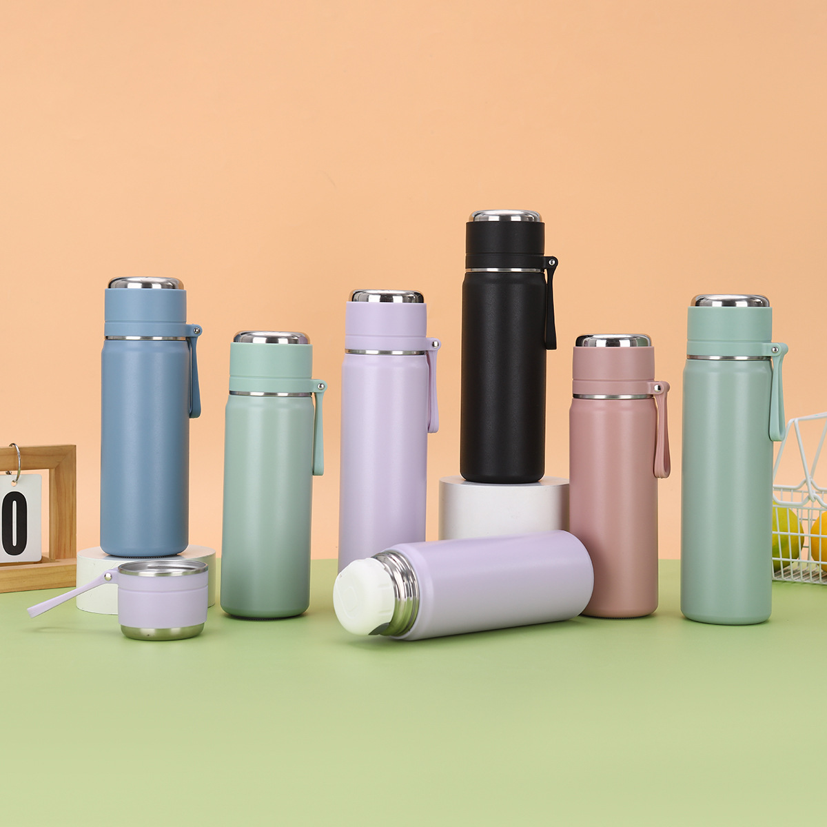 Wholesale of new 316 stainless steel double-layer vacuum insulated cups, outdoor portable sports water bottles with lifting ropes and jumping cups full figure