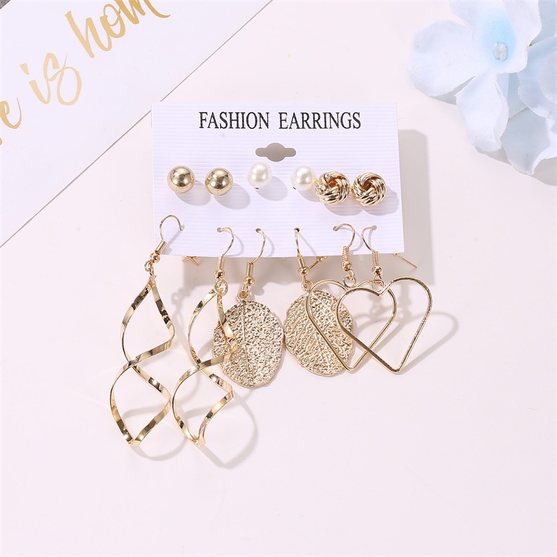 A popular European and American earpiece fashion leaf cross heart set of earrings, 6 pairs of earrings, with windmill pearl stud clips Item Picture