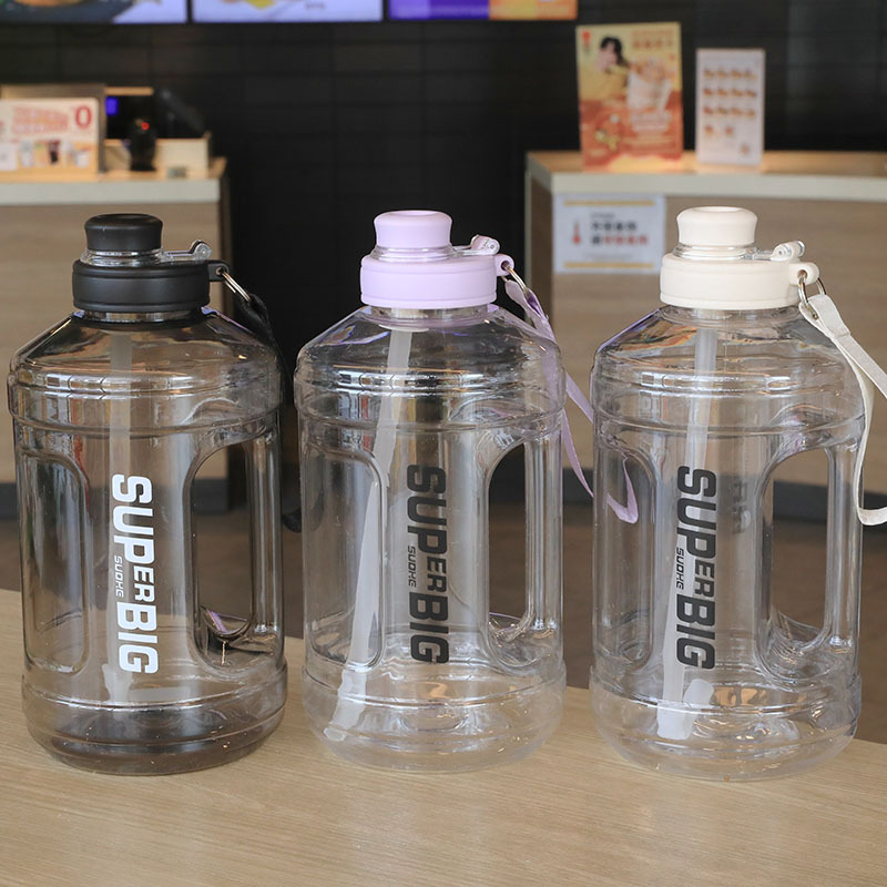 Wholesale of high-appearation-level large-capacity ton-ton water bottles, outdoor portable sports water bottles, fitness plastic water cups, and large-belted cups full figure