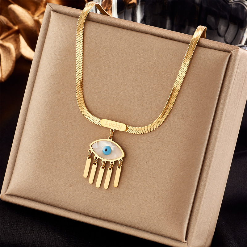 European and American cross-border retro niche fashion high-end U-shaped snake bone chain titanium steel blue eye tassel pendant necklace full figure