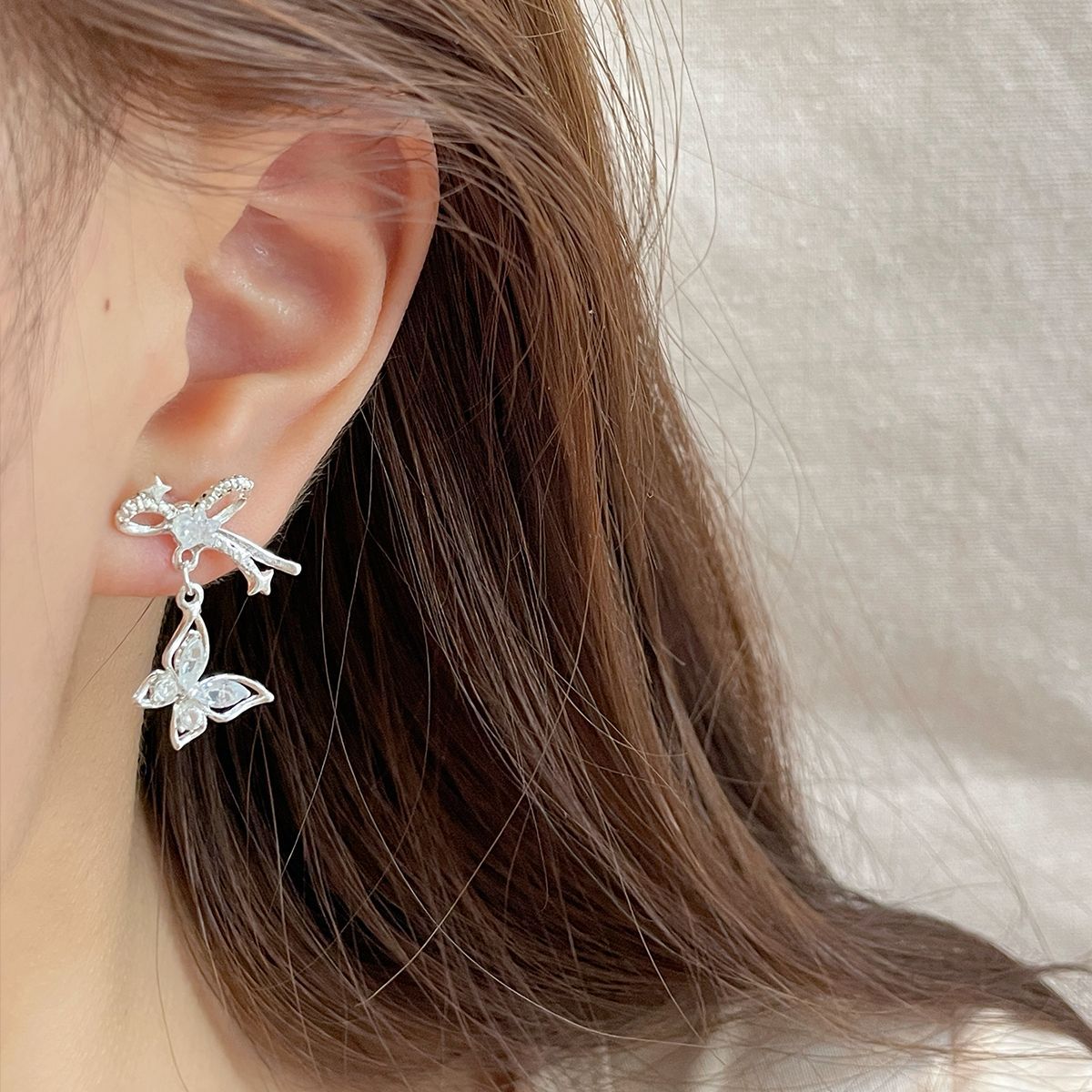 Korean version zircon bow star earrings, women's silver needle, niche design, simple and exquisite, versatile, light luxury earrings details Picture