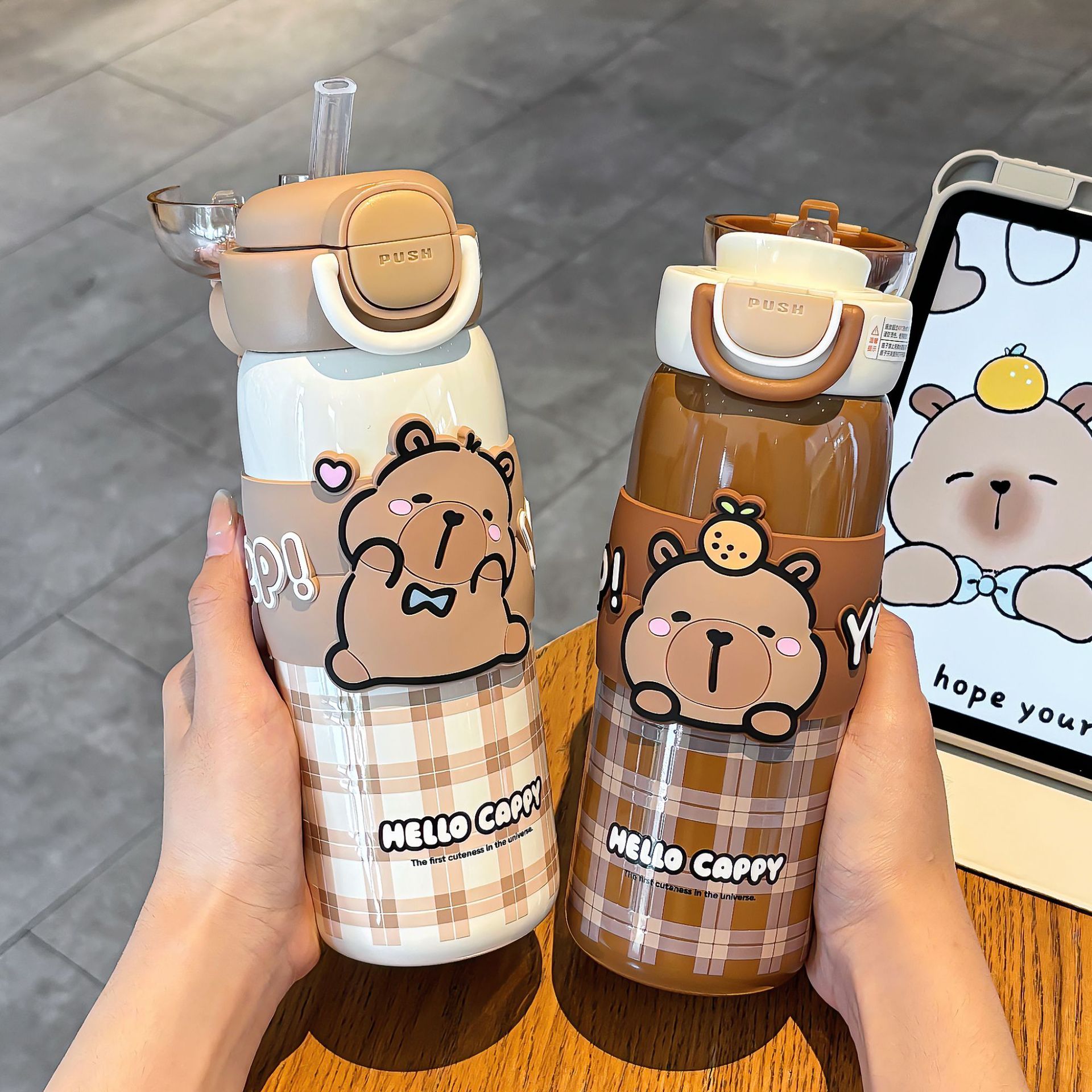 A cute Kapi Barraga-patterned student portable thermos cup with lock design, a double-drinking silicone spout drinking cup Application Scenario