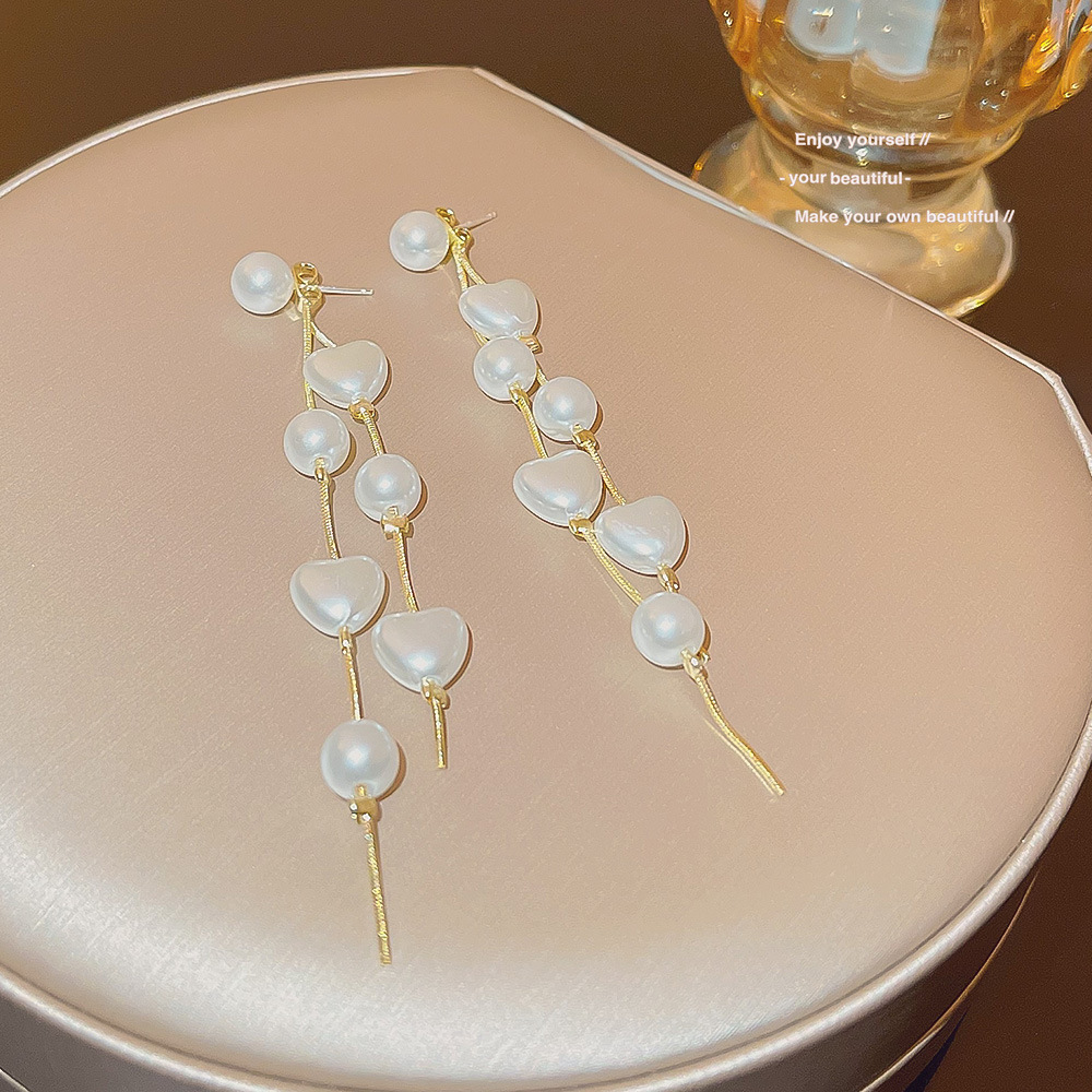 Luxurious heart-shaped pearl tassel earrings for socialites, with a unique design sense, versatile and exquisite earrings, and a high-end feel. Super fairy-like earrings details Picture