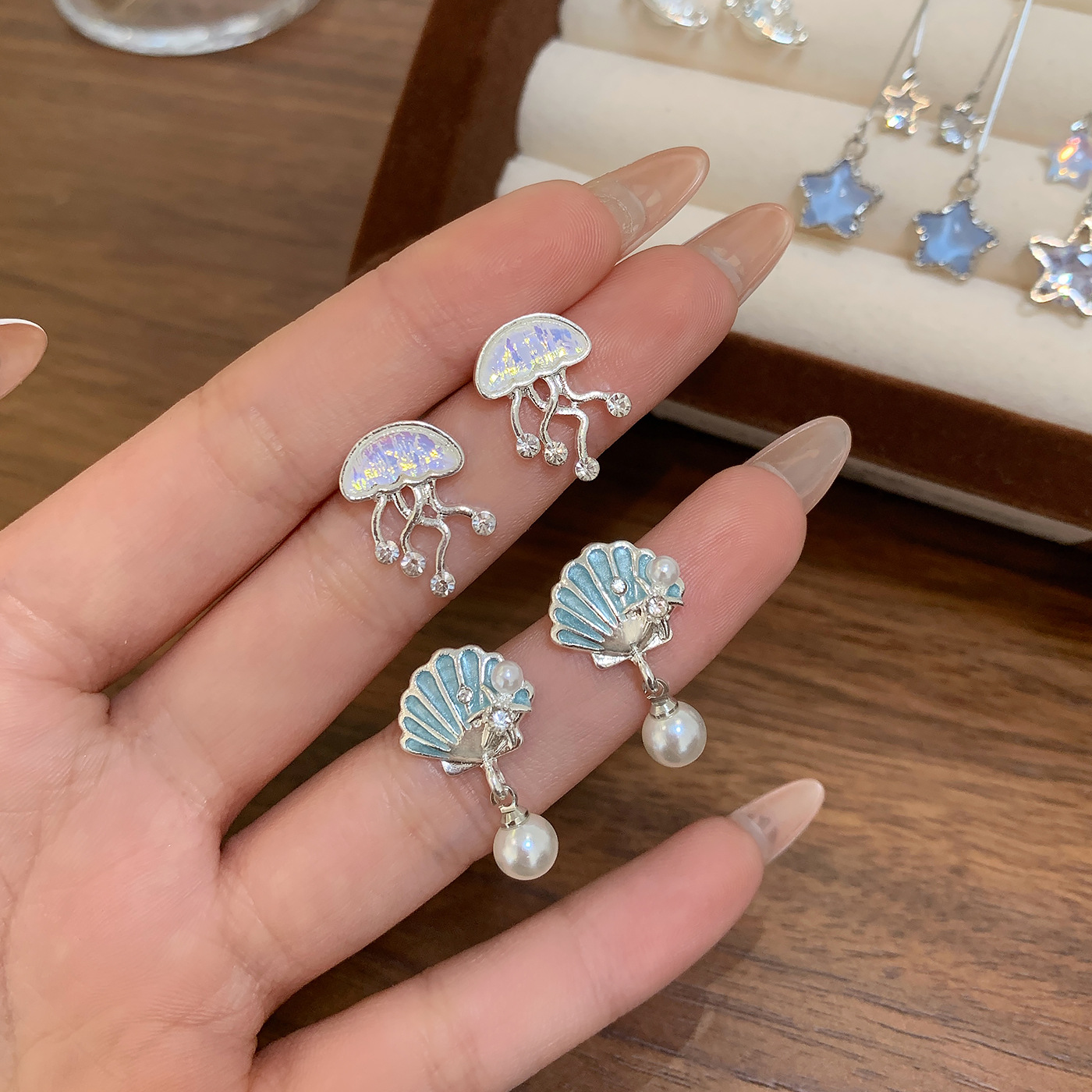 Summer super fairy ocean jellyfish zircon earrings, women's silver needle, sweet and exquisite, five-pointed star tassel shell stud earrings Specification drawing