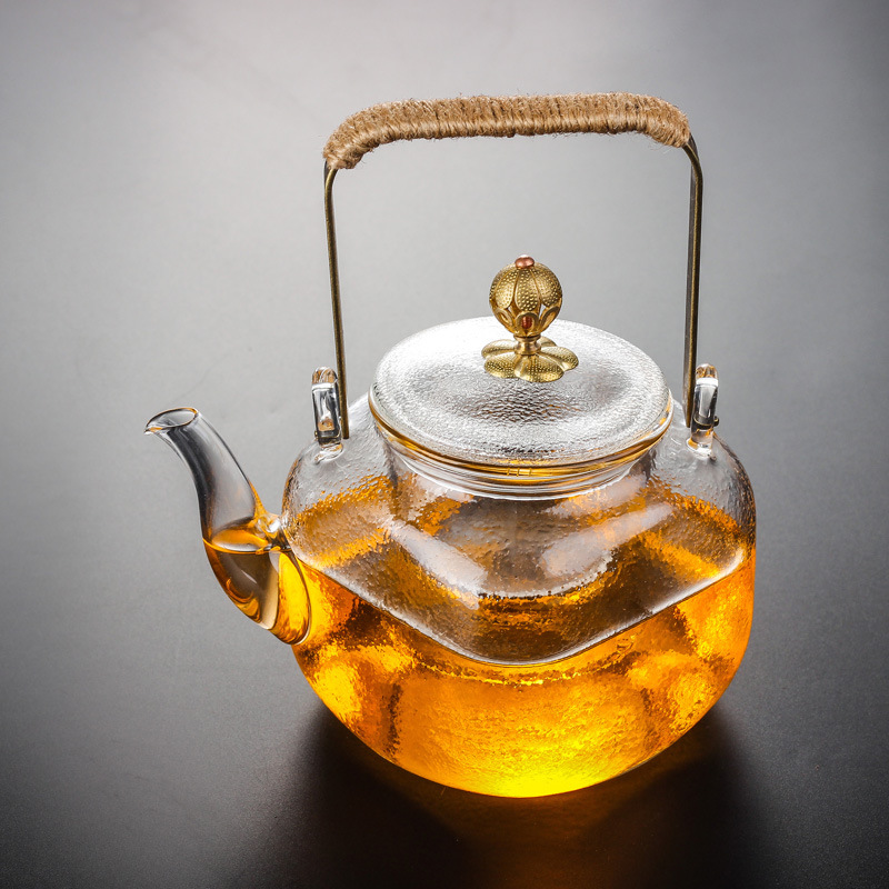 Wholesale high borosilicate glass flower teapots, handle teapots, household high-end brewing teapots, glass teapots, tea sets, heat-resistant full figure