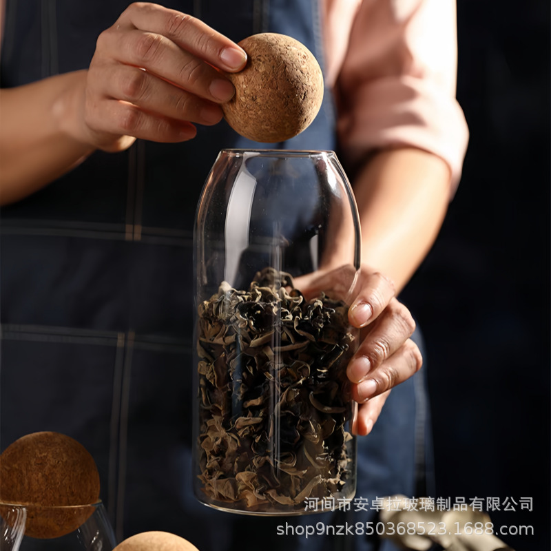 The manufacturer supplies food-grade transparent glass storage tanks with cork stoppers for coffee beans, snacks, and grains Specification drawing