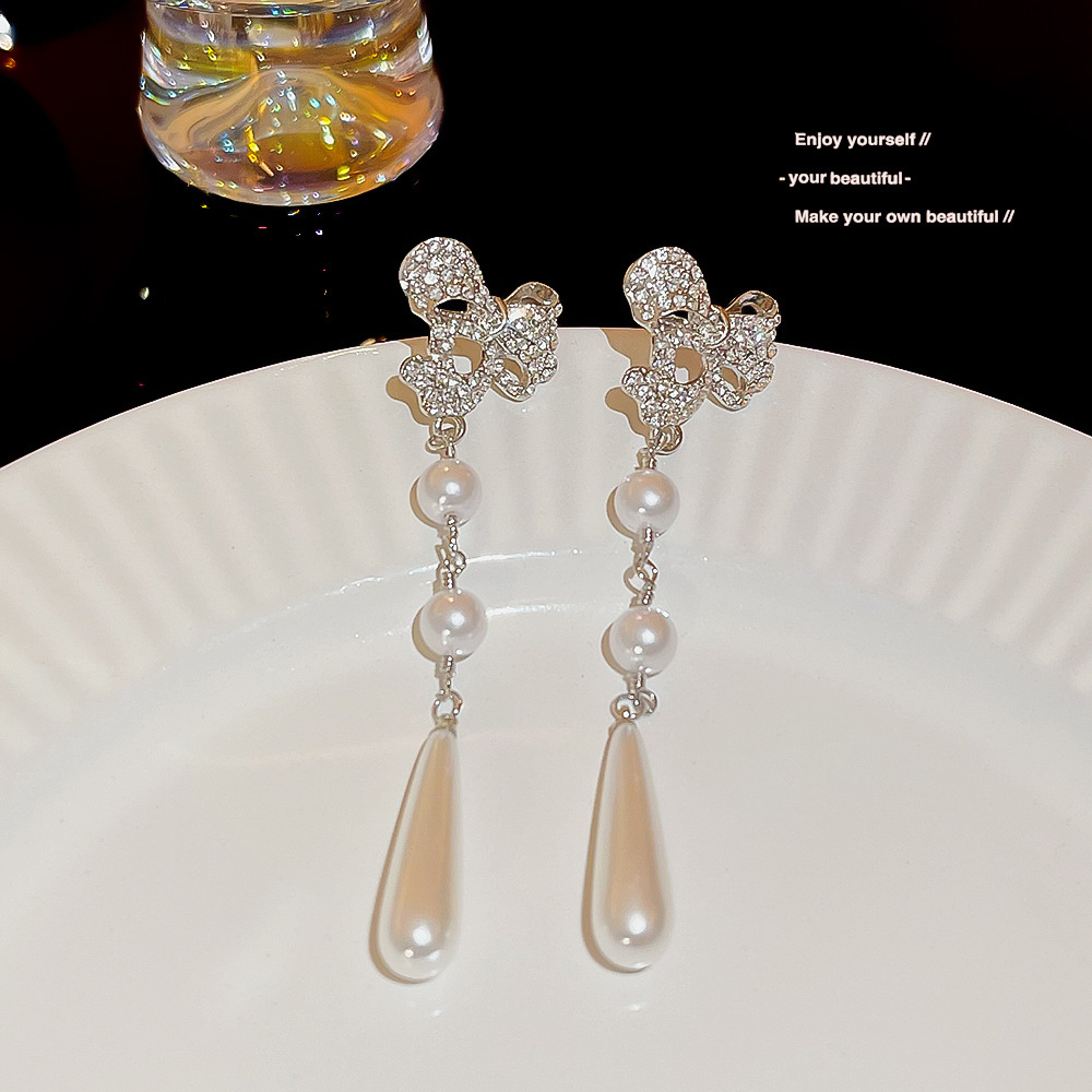 European and American exaggerated long full-diamond irregular tassel earrings, light luxury and high-end, trendy bestsellers, individual and elegant earrings details Picture
