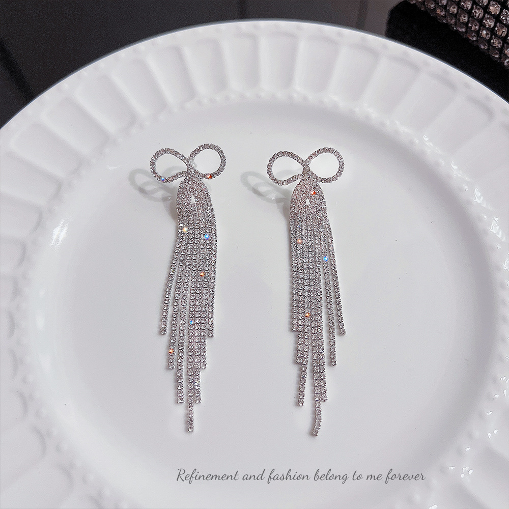 The 2025 new trendy Korean full-diamond bow long tassel earrings are a high-end and stylish light luxury accessory for female Internet celebrities details Picture