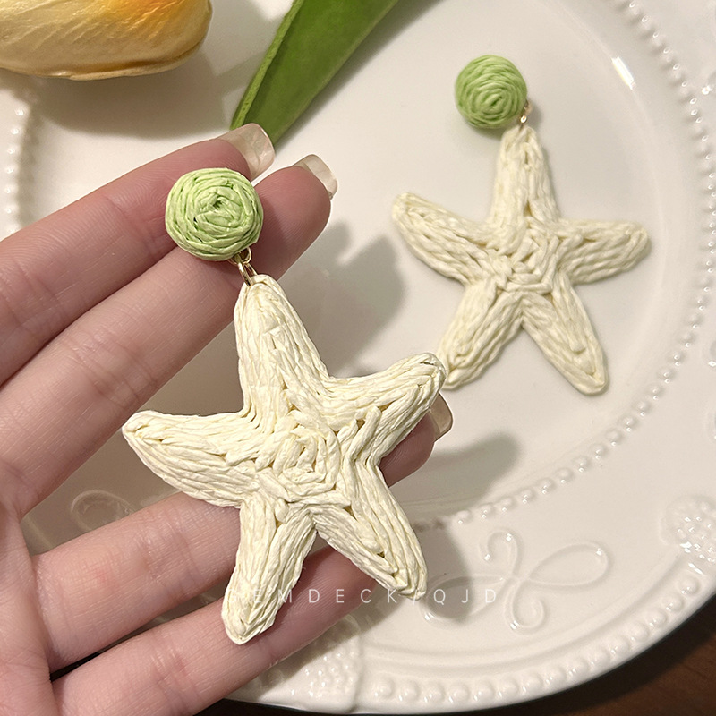 Seaside vacation style starfish earrings, summer white, fresh and sweet earrings, high-end, exaggerated and elegant, simple stud earrings details Picture