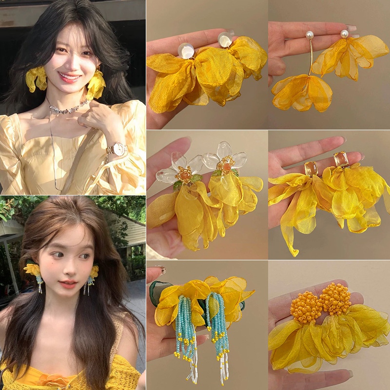 Super fairy yellow mesh earrings, women's vacation wind and snow woven sweet stud earrings, atmosphere, seaside high-end style, elegant earrings full figure