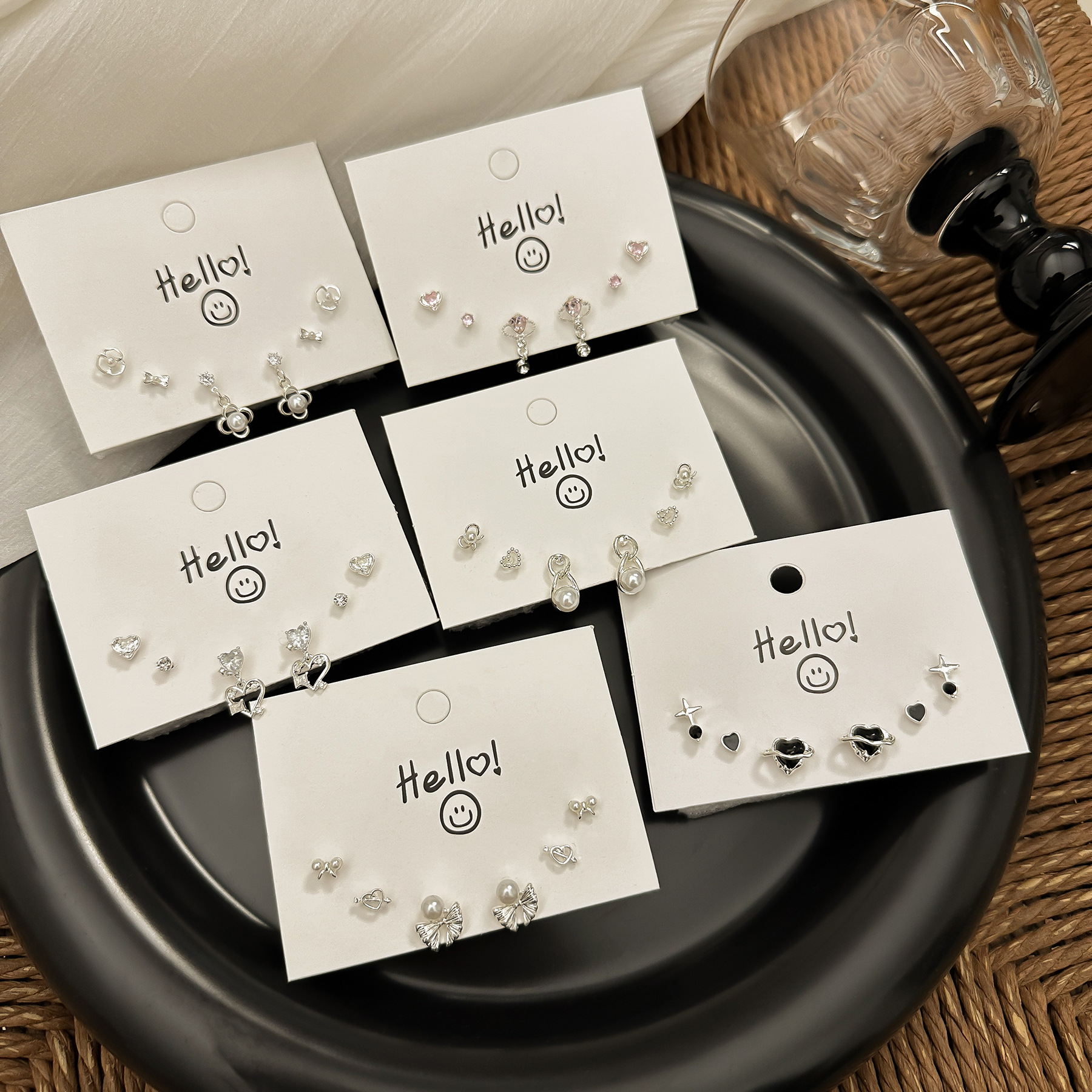 Silver needle stud earrings set, exquisite, light luxury, niche design sense, women's zircon bow heart-shaped sweet earrings wholesale Specification drawing