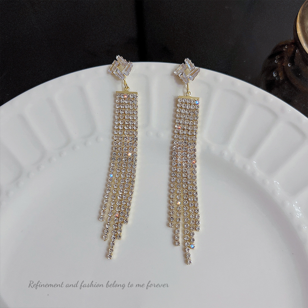 925 Silver needle Super Sparkling Full Diamond long tassel earrings, women's Instagram trendy, light luxury and niche design sense stud earrings wholesale full figure