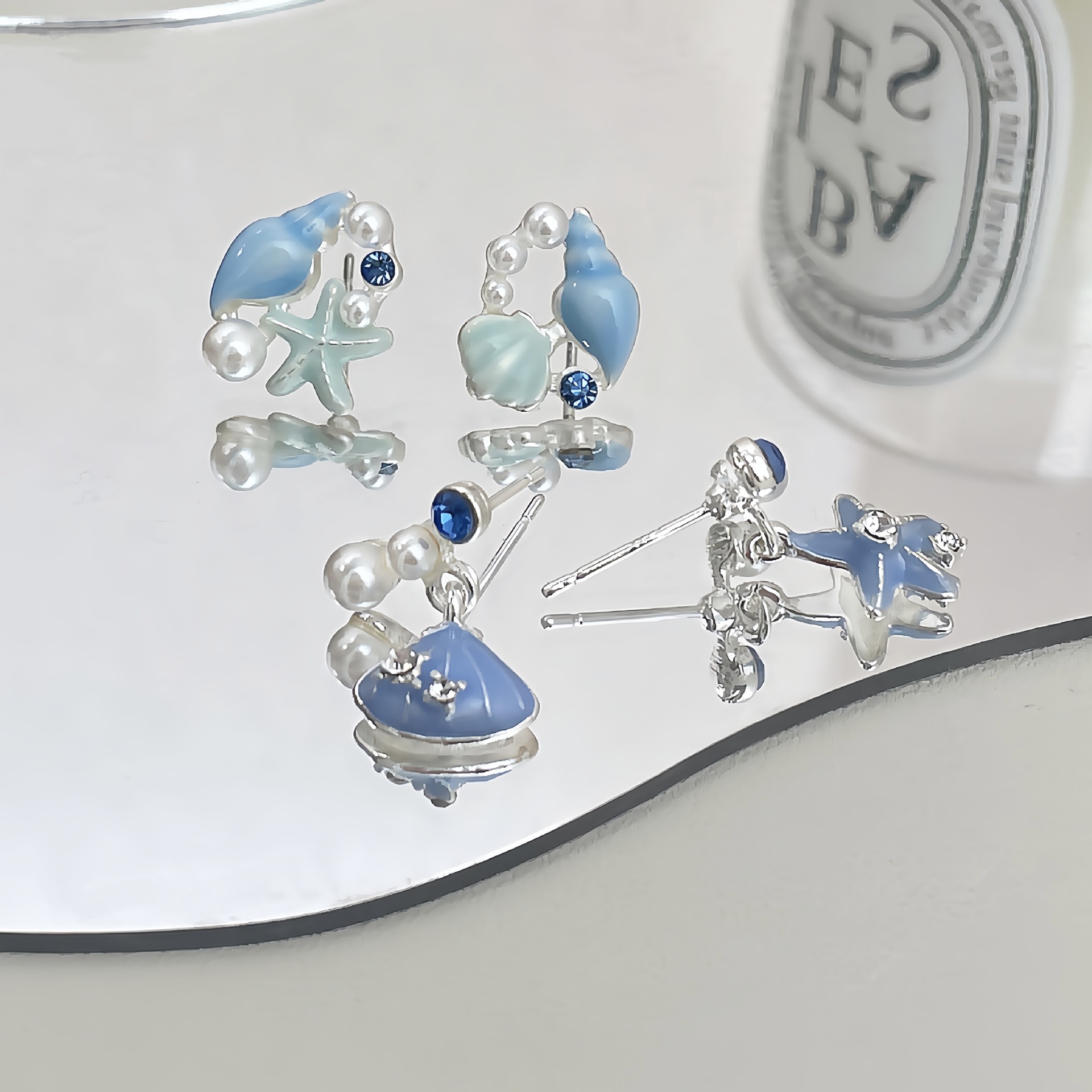 Blue ocean shell starfish stud women's silver needle vacation style summer new niche design exquisite earrings Application Scenario