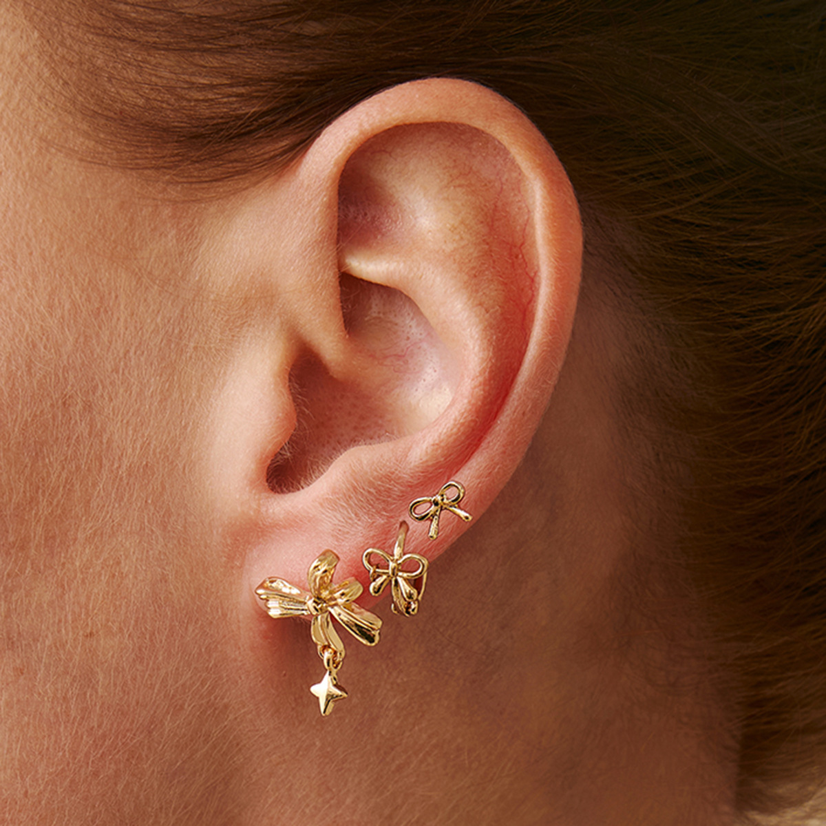 European and American ins cross-border vacation style flower starfish stud earrings set, sweet and cool light luxury small bow earrings accessory Specification drawing