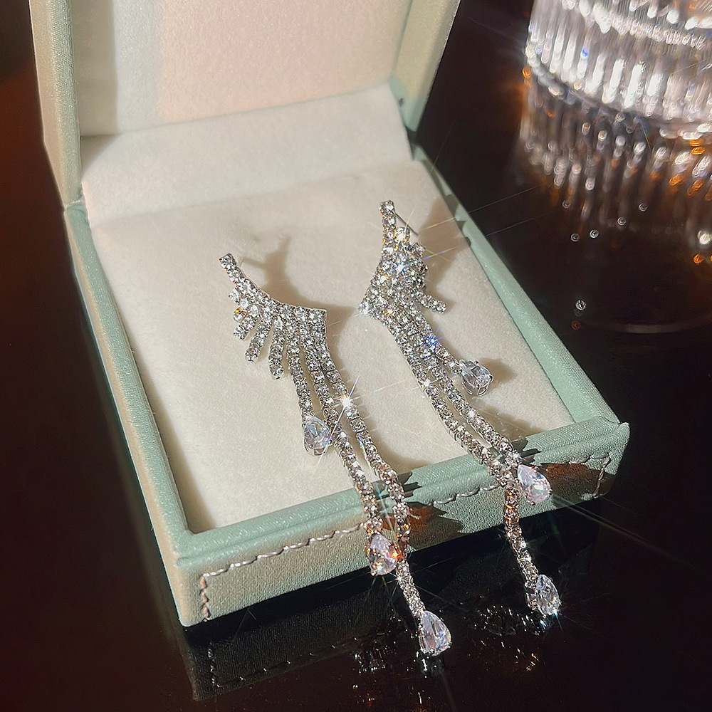 925 Silver Needle long and elegant, slimming face earrings, high-end look, popular zircon earrings, grand earrings, autumn and winter accessories Application Scenario