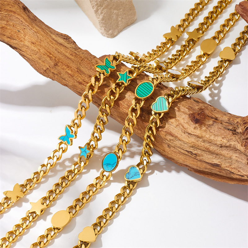 A new cross-border gold-plated titanium steel chain oval geometric five-pointed star heart-shaped butterfly pattern accessory necklace from Europe and America full figure