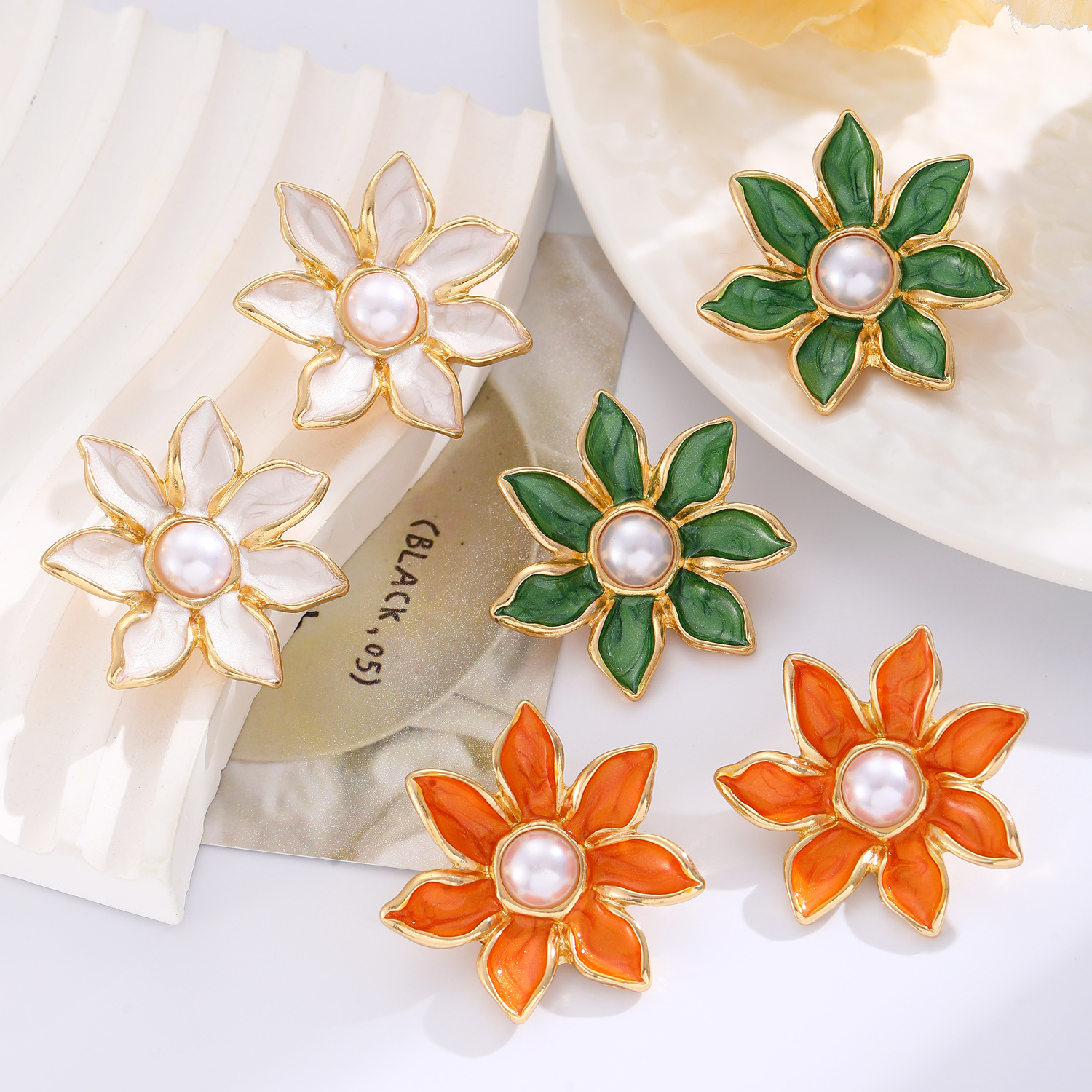 vintage colored oil-dripping flower earrings, a fresh and delicate forest-themed style with pearl petal stud earrings Application Scenario