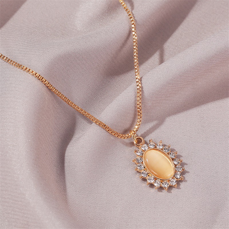 Korean-style cat's eye sunflower earrings, French-style micro-inlaid zircon oval necklace, retro lady jewelry Specification drawing