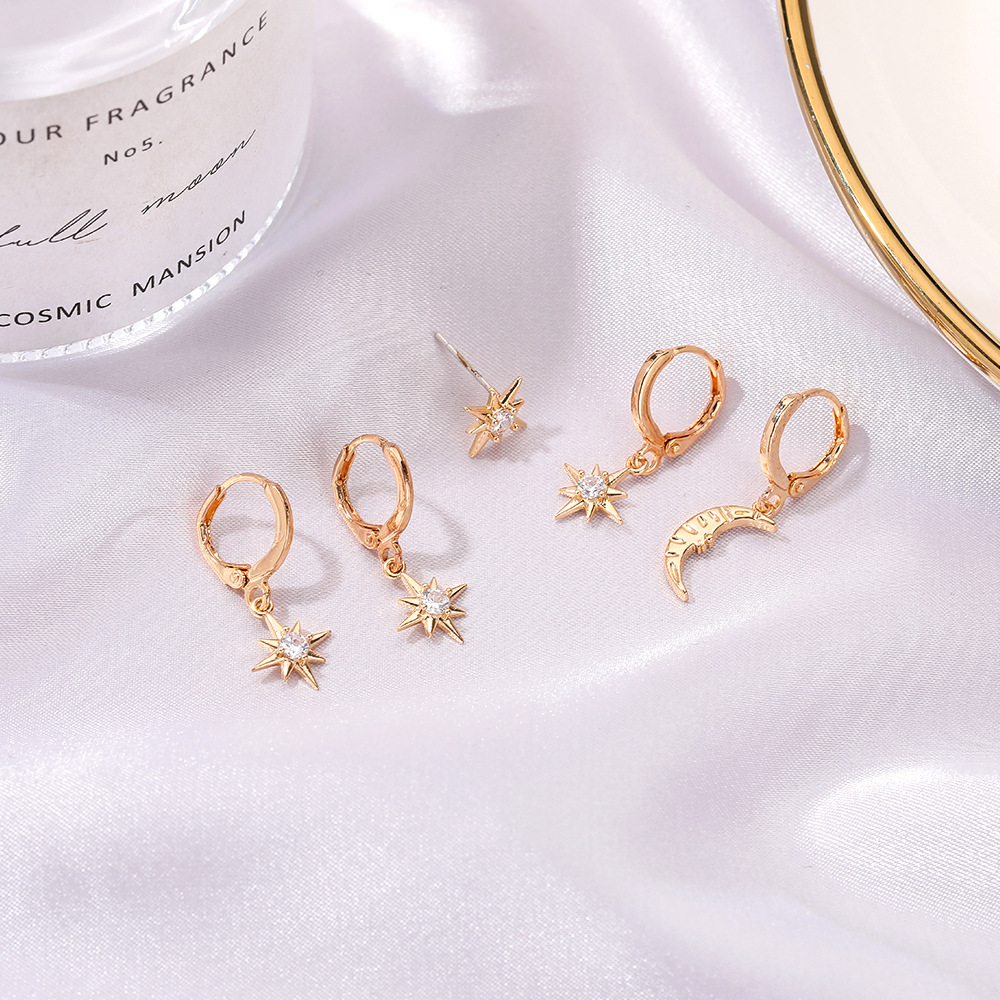 European and American cross-border earrings, asymmetrical star and moon ear buckles, women's personalized and trendy single-sided set earrings details Picture