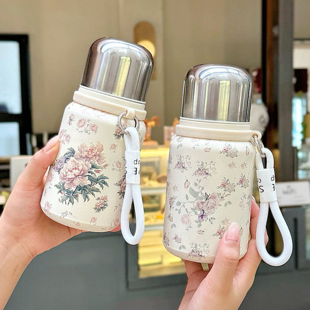 The new rose and peony Chinese-style retro insulated cup with a tea tray and a hand-held water bottle has a large capacity and can be carried with a string details Picture