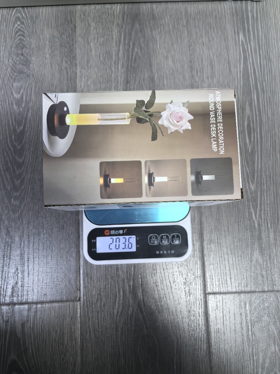 A vase with a lantern in it Item Picture