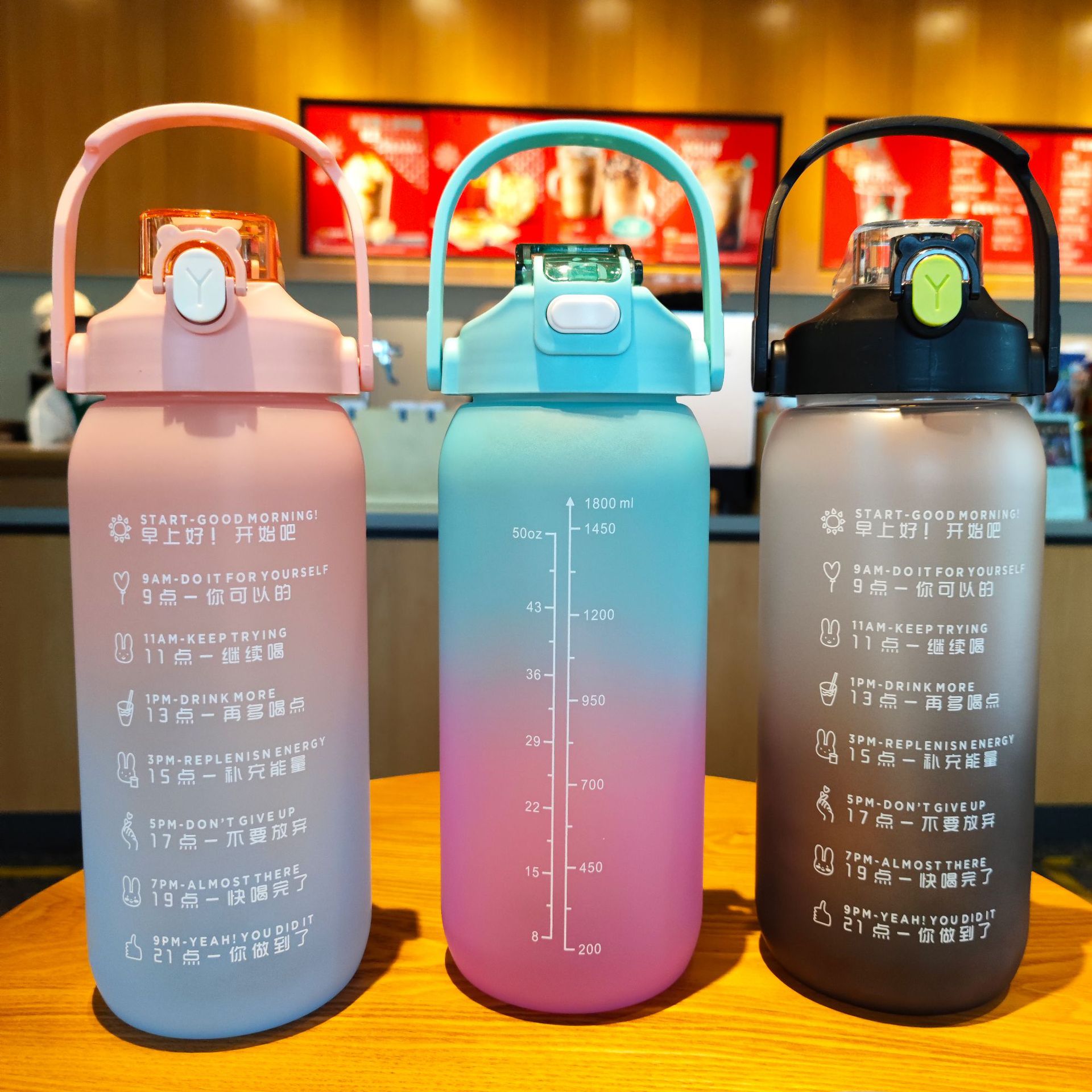 New large-capacity suction nozzle direct drinking water cup, portable handle plastic water bottle, pop-up cap gradient frosted water bottle full figure