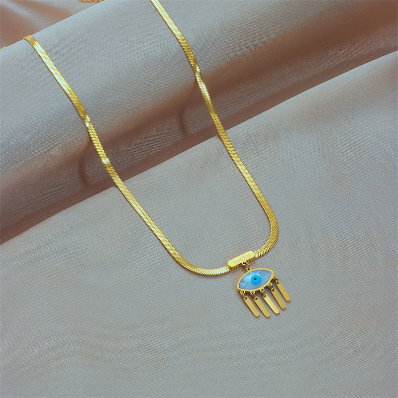 European and American cross-border retro niche fashion high-end U-shaped snake bone chain titanium steel blue eye tassel pendant necklace details Picture