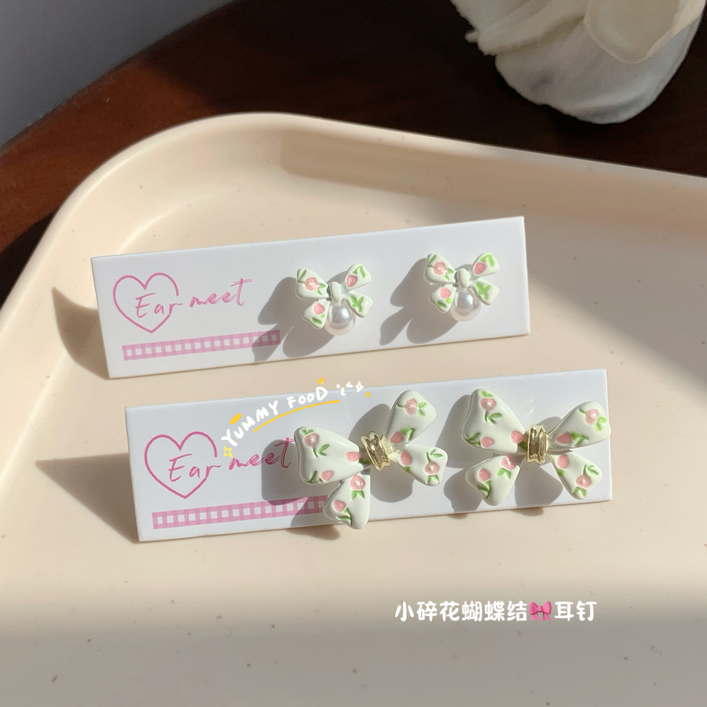 Summer new oil-dripping floral bow stud earrings, women's silver needle, fresh design, niche, simple and versatile earrings full figure