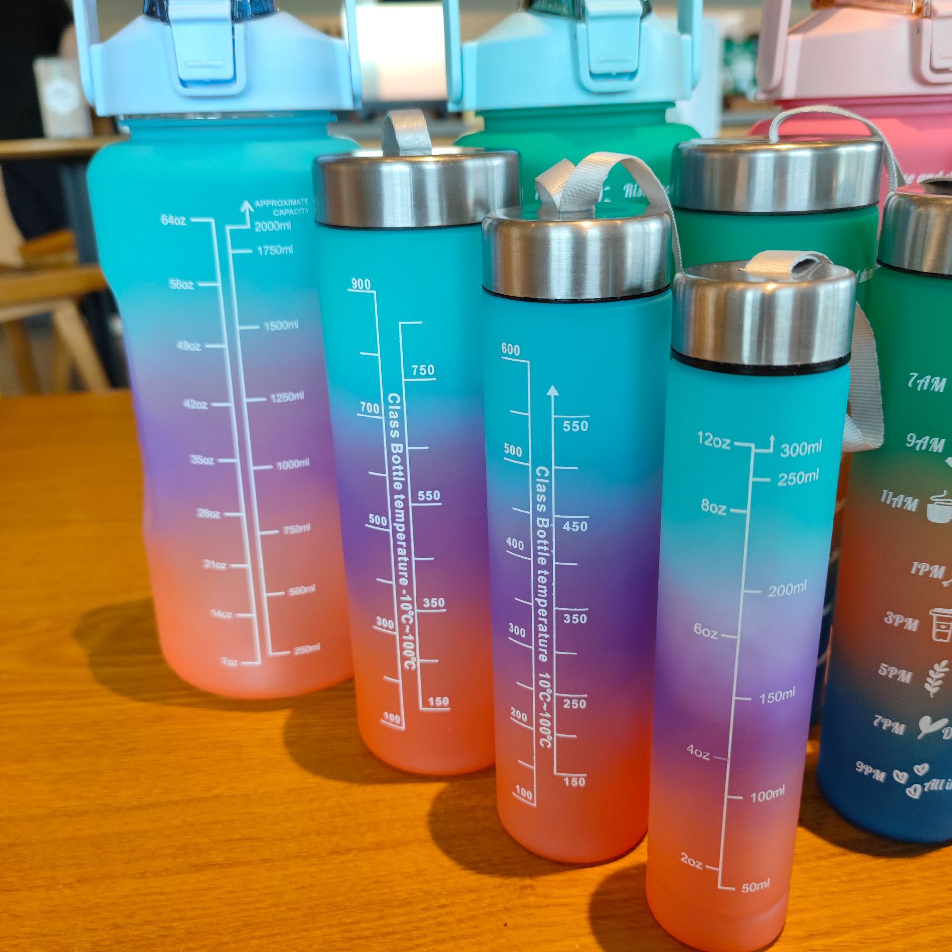 Four-piece set of gradient frosted water cup, portable drawstring space cup, sports water bottle, large-capacity bouncing straw cup details Picture