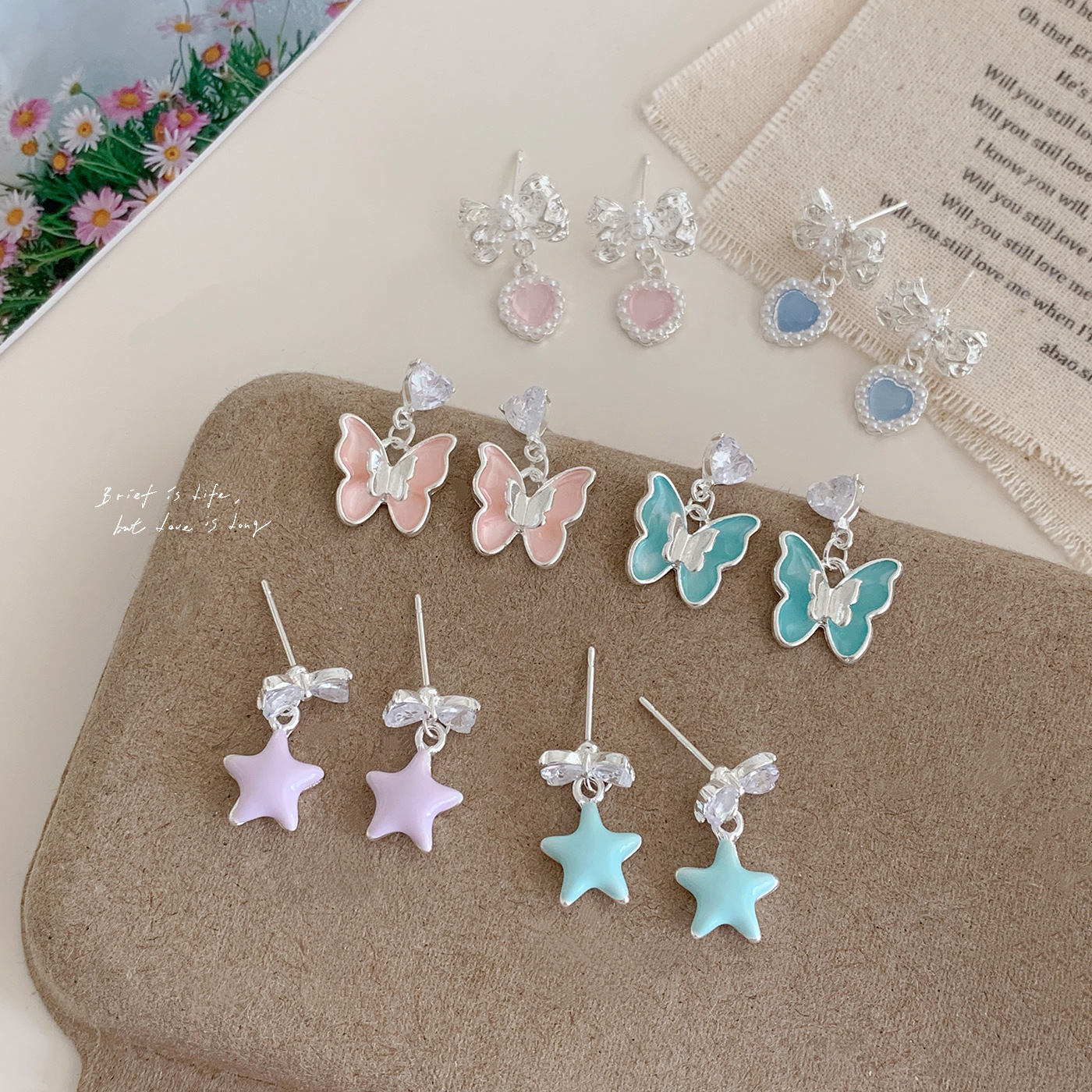 New colorful star butterfly earrings, women's silver needle, sweet and niche design, exquisite pearl heart, versatile earrings full figure