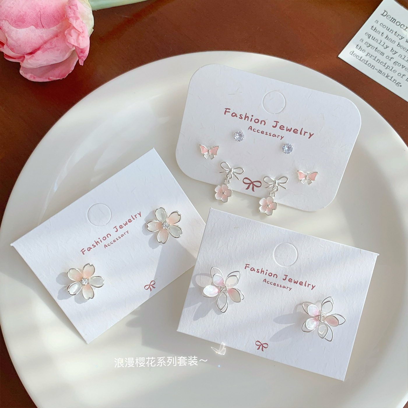 Sweet pink cherry blossom earrings for spring and summer, with a light luxury and high-end feel. Silver needle, super ethereal butterfly, elegant oil-dripping earrings full figure