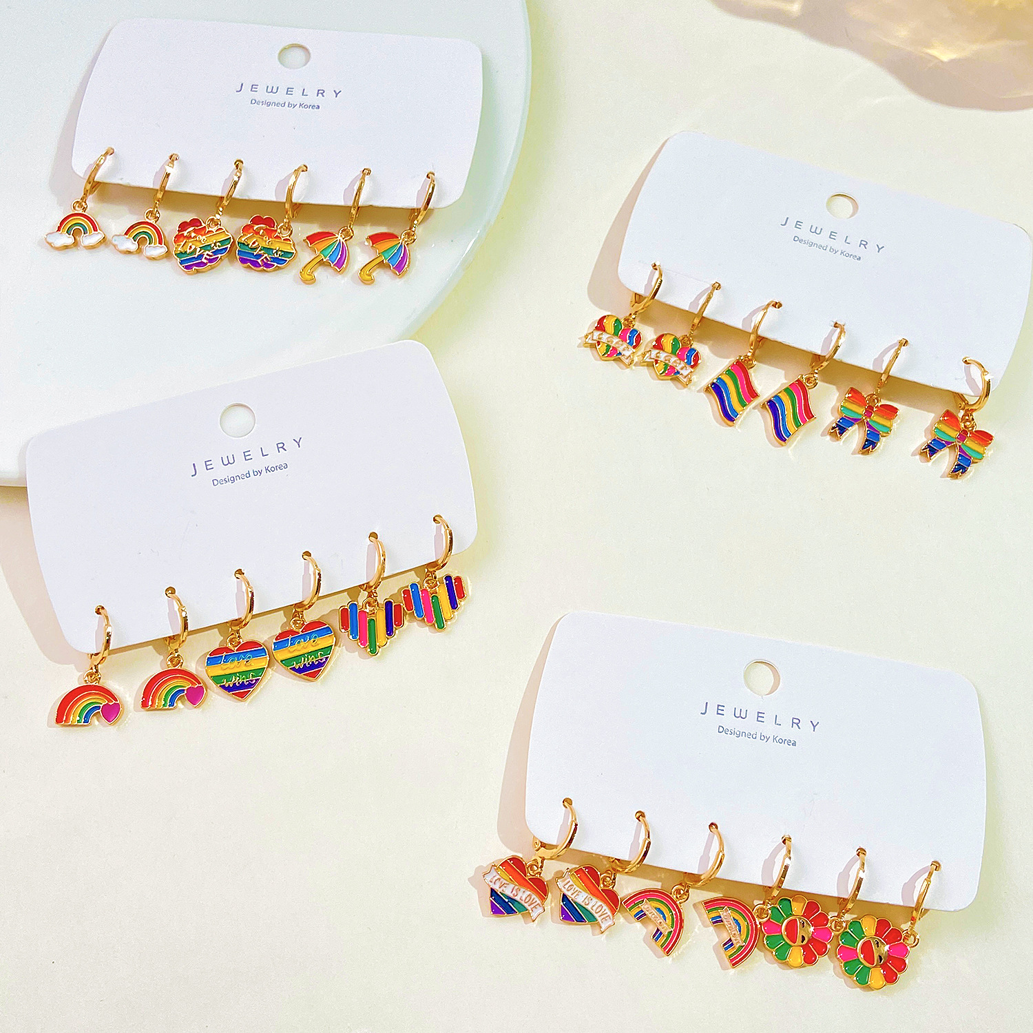 Colorful oil-dripping earrings set, European and American ins cloud flag bow heart earrings, cross-border women's accessories Specification drawing