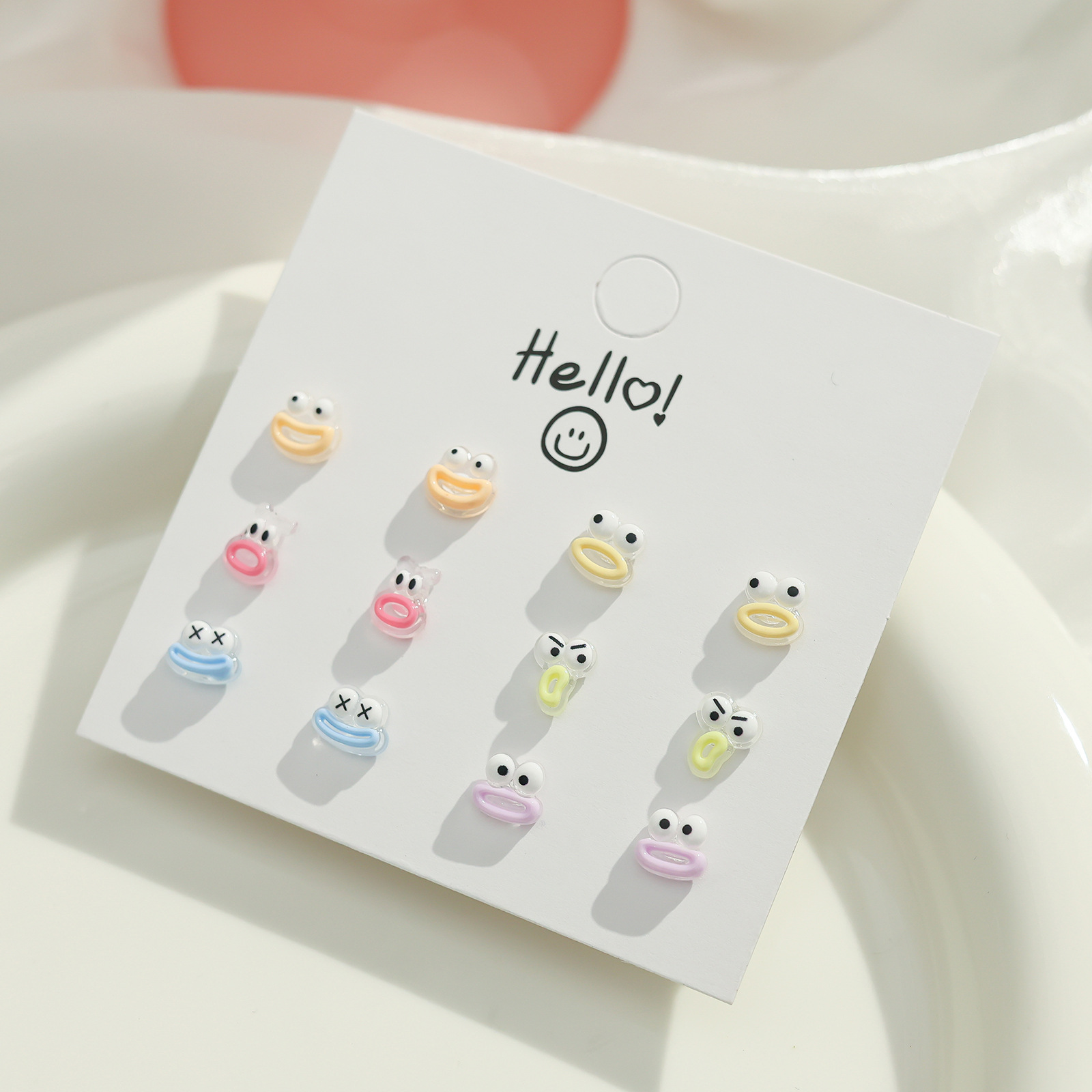 The funny expression resin stud set for girls is cute, sweet and versatile. Dopamine earrings are selling well at a street stall. Wholesale of earrings Specification drawing