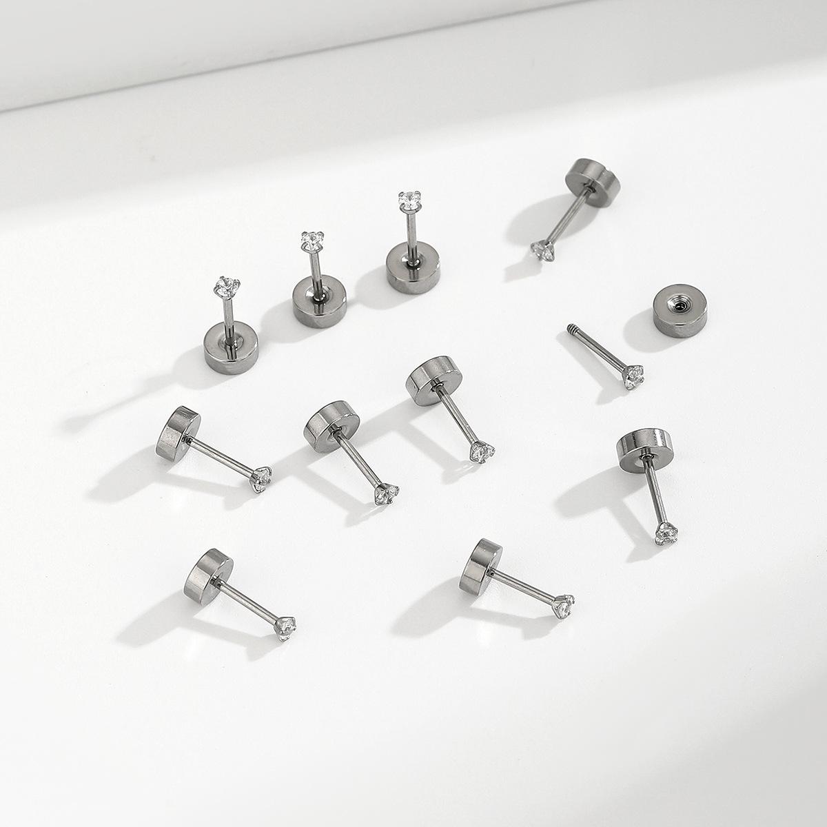 2025 New titanium alloy ear studs 2.0 Fine needle zircon best-selling niche design ear-piercing ear bone stud earrings full figure