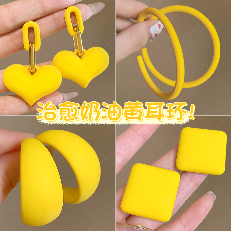 Summer dopamine yellow earrings for women, a niche high-end and elegant style, new 2025 best-selling exaggerated earrings full figure