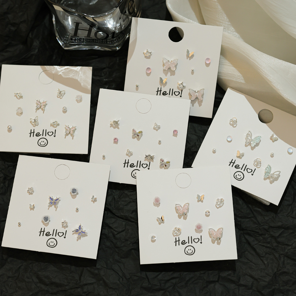 Sweet and cute silver needle, small and exquisite stud earrings, niche new set, ins fresh glitter butterfly earrings wholesale Specification drawing