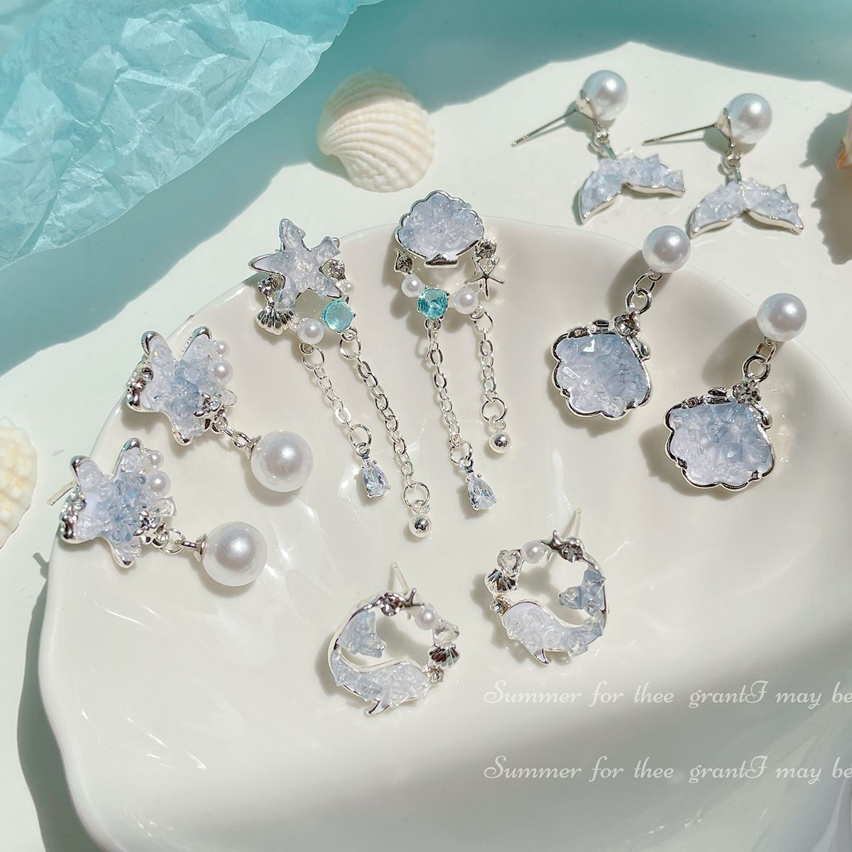 Fresh and delicate ocean crystal earrings, women's silver needle, niche design, exquisite and versatile, shell and starfish high-end earrings full figure