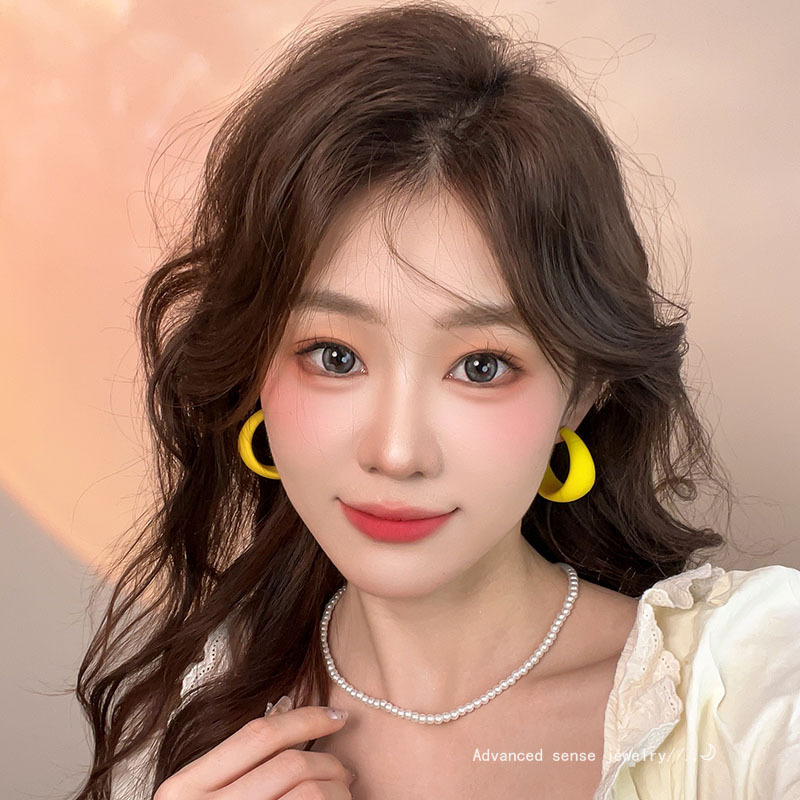 Yellow mesh flower earrings for women, 2025 new style, high-end forest-themed fresh and delicate stud earrings, elegant vacation style earrings details Picture