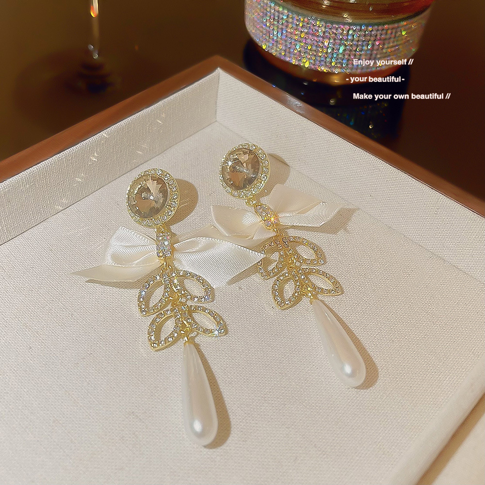 Pearl high-end bow tassel earrings, long and versatile, unique sweet and cool style earrings, fashionable and trendy earrings for women details Picture