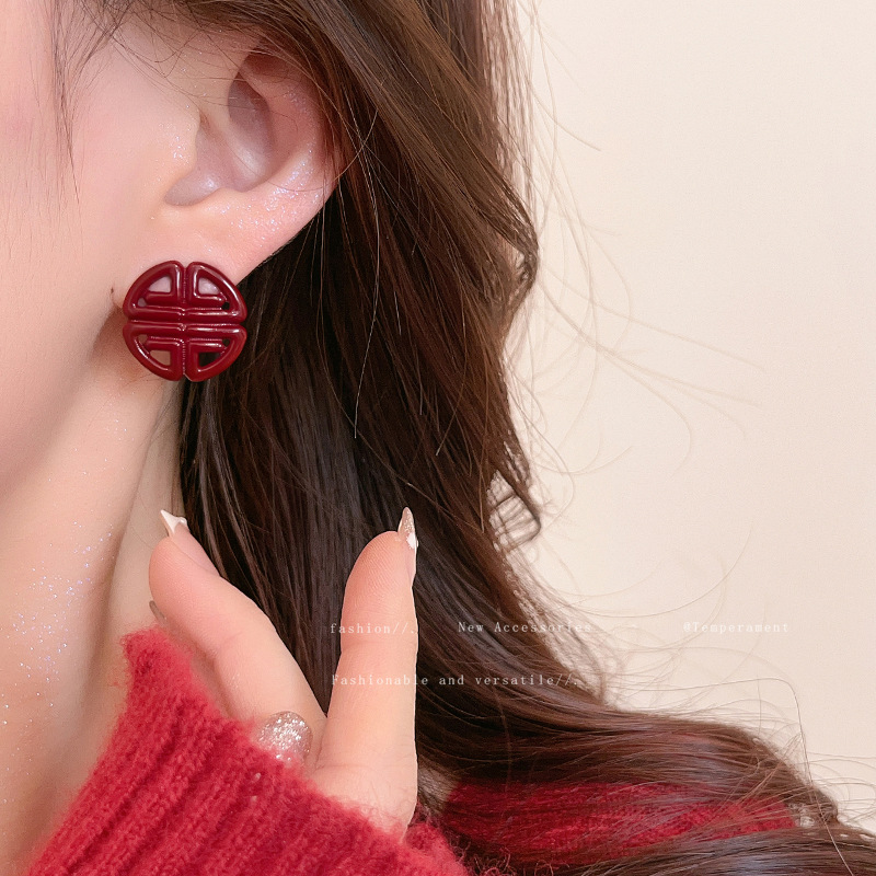 Ankela Red hollowed-out "Xi" character ear studs for Women 2024 New bestseller, high-end and niche ear studs, fashionable and versatile earrings details Picture