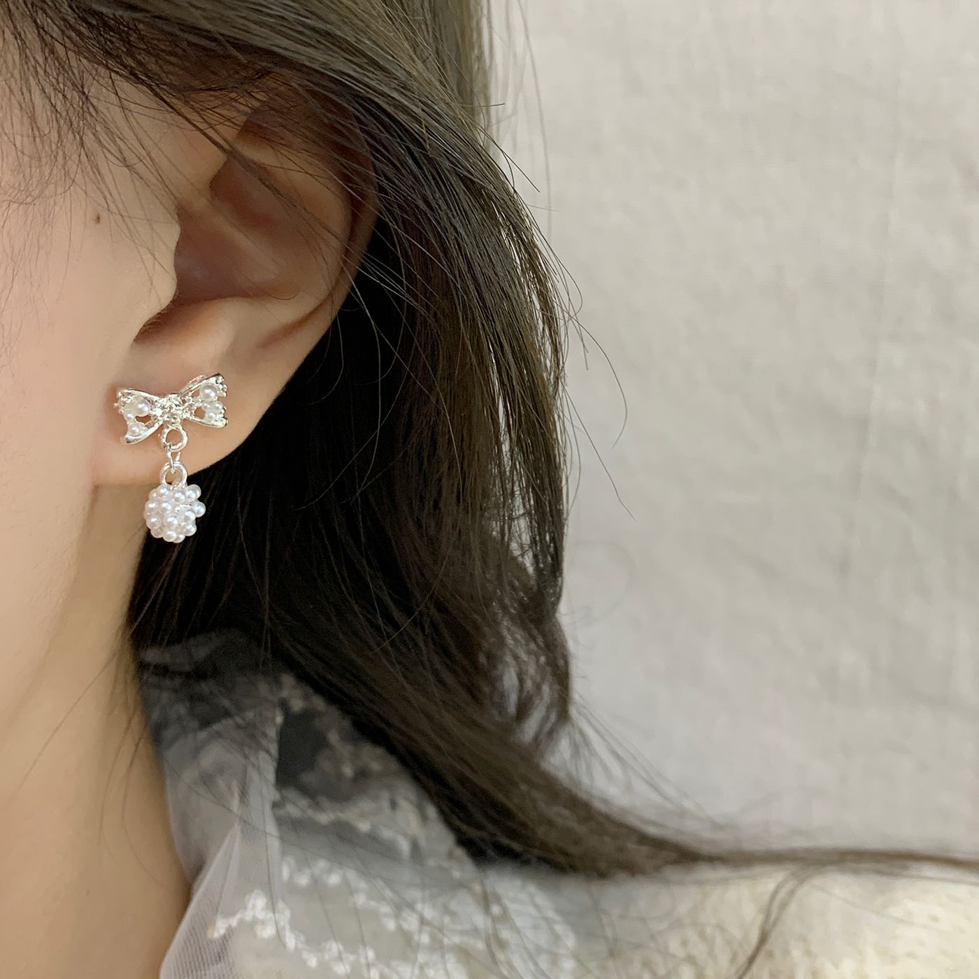 Spring Korean-style light luxury brushed pearl flower ball bow earrings, women's silver needle exquisite and high-end fashionable earrings details Picture