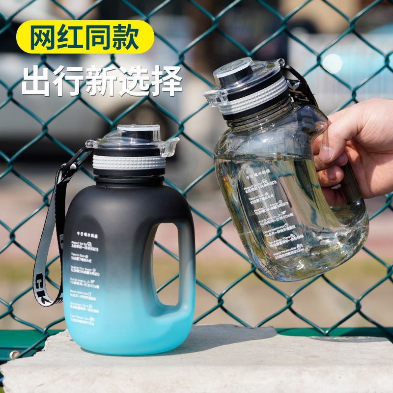 Factory direct supply of 1.2L large-capacity ton-ton barrels, frosted gradient plastic cups with scale markings, portable car-mounted handle cups full figure