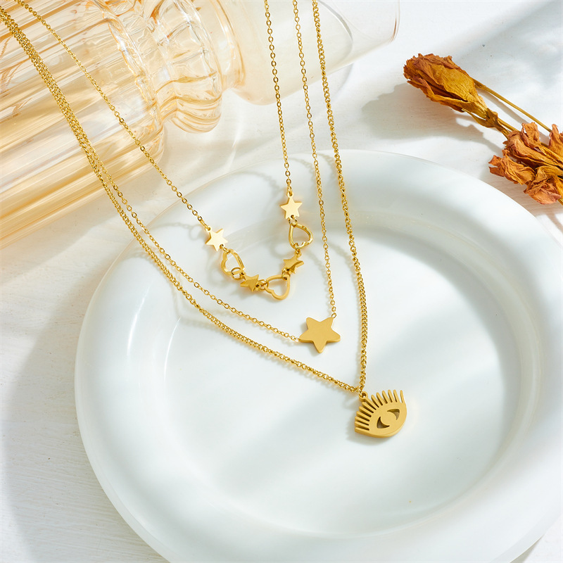 European and American fashion, creativity, individuality, retro multi-layer layered gold-plated titanium steel heart-shaped eye star-shaped accessory chain necklace details Picture