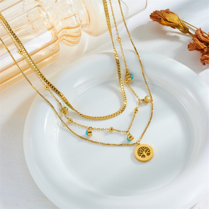 Fashionable and elegant, simple design sense, multi-layer overlapping collarbone chain, life tree, turquoise pendant, titanium steel necklace details Picture