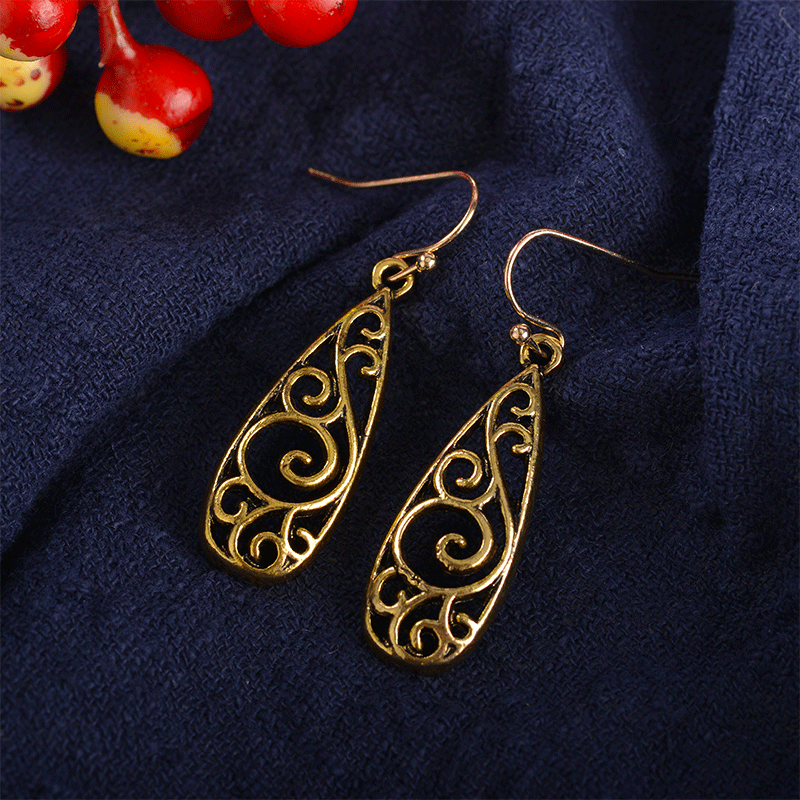 European and American export retro alloy carved court earrings for women, cross-border ethnic style water drop hollowed-out pattern earrings Specification drawing