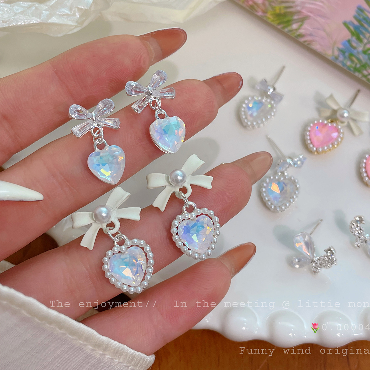 Summer new style sea salt transparent white bow Mermaid Girl heart earrings for women, exquisite and versatile, sweet and elegant earrings full figure
