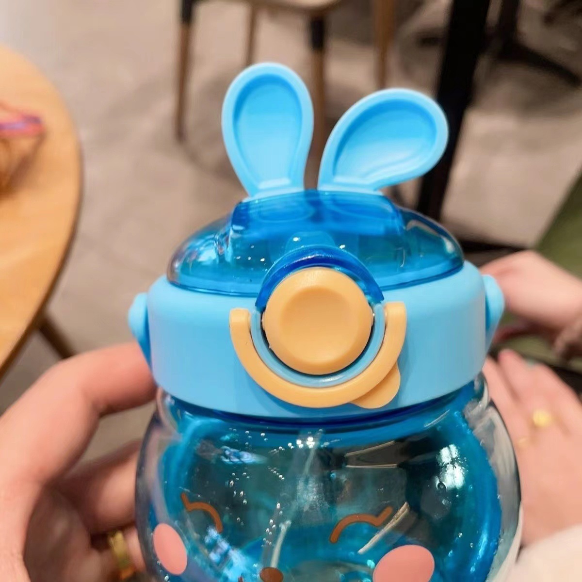Best-selling cute little rabbit children's outdoor sports water bottle, cartoon large-capacity plastic water cup with shoulder strap straw cup details Picture