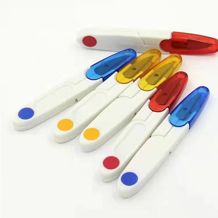 Wholesale of cross-stitch small scissors, transparent cover thread end scissors, safety sewing scissors, household U-shaped plastic spring yarn scissors Application Scenario